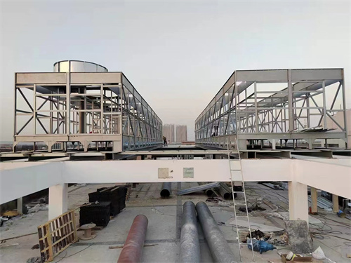 圓形冷卻塔填料確保操作系統(tǒng)的平常運(yùn)行,抵制水溫的流失散熱安置,圓形冷卻塔圖片